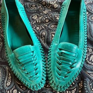 Genuine leather turquoise slip ons.